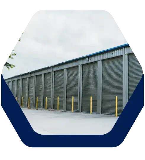 Row of drive-up storage units with roll-up doors at Battle Creek Storage in Broken Arrow, OK