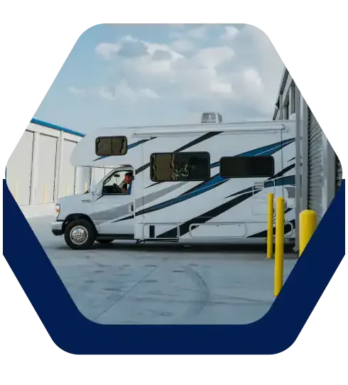 Class C motorhome parked by the drive-up storage buildings at Battle Creek Storage in Broken Arrow, OK